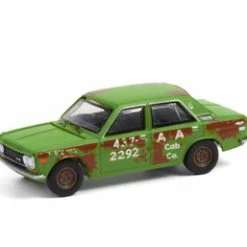 1970 Datsun 510 4-Door Sedan A&A Cab Co, Green With Rust - Greenlight 47070B/48 - 1/64 Diecast Car