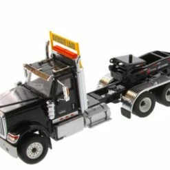 International HX520 SFFA Tandem Tractor With XL 120 Low-Profile HDG Trailer, Black - Diecast Masters 71017 - 1/50 Scale Diecast Model Toy Car